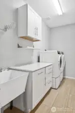 Laundry room leading to attached garage