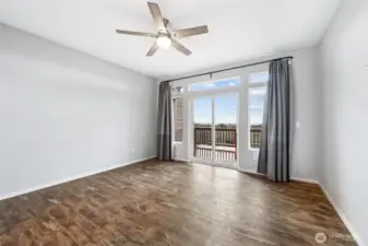 Master bedroom with private entrance to back deck