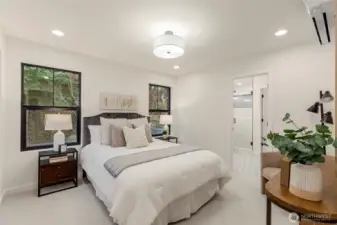 This primary bedroom has great natural light while still providing privacy.