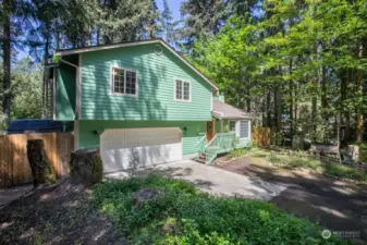 Surrounded by trees of all kinds, this large corner lot offers peace and tranquility.