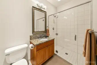 3/4 bathroom near the bedroom and office is clean and simple.  Shower is easy for roll in access if needed.