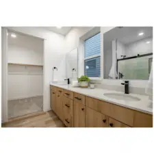 Dual primary vanity sinks.