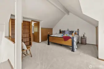 Primary suite on upper floor is large and open!