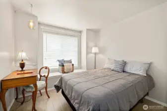 Bedroom #3 with window seat/storage.