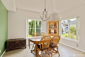 Separate dining room has plenty of space for hosting large gatherings.