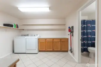 Utility room lower level with lot of space.