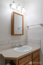 Third full bath downstairs.