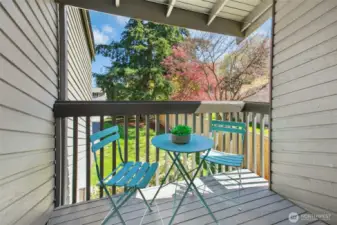 Covered deck off the primary bedroom—perfect for morning coffee, reading a book, or unwinding after a long day.