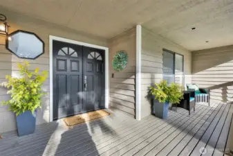 Sit on this giant, covered front porch, wave at your neighbors and stay dry when it rains and cool in the sunshine. It also has a sliding door (not shown so you can close off the front porch.