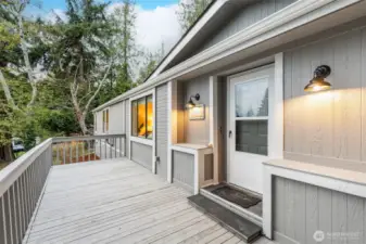 Updates include fresh paint inside and out, new carpet, stylish lighting, and new fixtures.