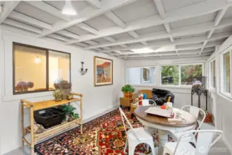 Enclosed 230 sq ft porch with backyard access adds even more gathering space.