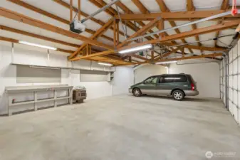 Plenty of room for RV/boat parking, and a pellet stove in the detached 3 car garage, and space for tinkering and storage in 3 additional outbuildings.