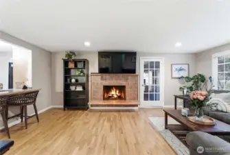 cozy wood burning fireplace hardwood floors