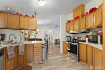 Large kitchen with abundant cabinets and counter space all stainless appliances are included.