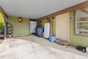 Carport with storage shed