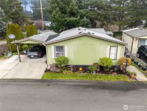 Fully landscaped with sprinklers.