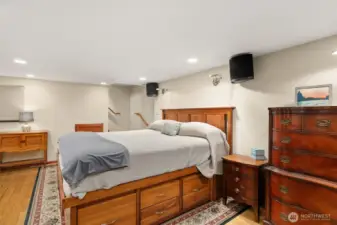 Lower level ADU w/ bedroom, gas fireplace, living room, 3/4 bath, kitchen, laundry and access to 1 car garage.