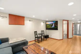 Lower level ADU w/ bedroom, gas fireplace, living room, 3/4 bath, kitchen, laundry and access to 1 car garage.