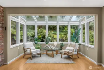 No more gloomy days! Come get all your vitamin d from this glorious atrium just off the kitchen.