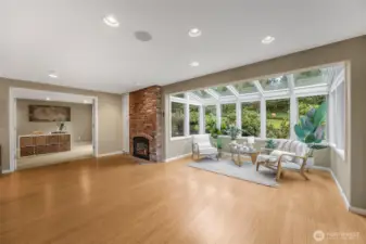 There is so much open space between the kitchen, office and sunroom. Dance party perhaps?