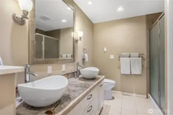 This is a 3/4 bath connected to the main floor office. Through a doorway just off to the right is the laundry room. The office is big enough to make this a main-floor junior suite.