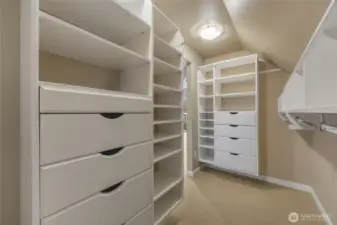 Primary bedroom closet with lovely built-ins