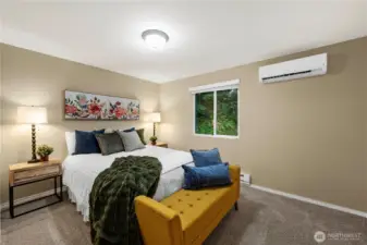 Spacious primary bedroom with large closet.