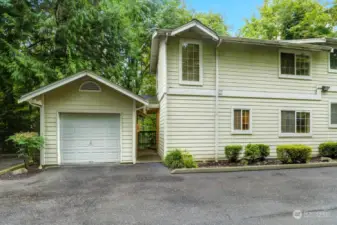 Enjoy the convenience of a connected garage with a breezeway, which provides shelter from the rain and snow as you make your way to the front door. The garage also has an extra storage built-in cabinet for tools and holiday decorations.