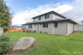 Spacious back yard that is fully fenced.