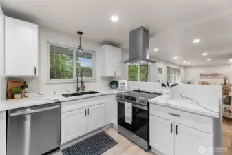Brand new kitchen with quartz countertops & stainless steel appliances