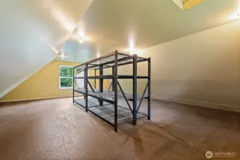560 SF of storage above the shop.
