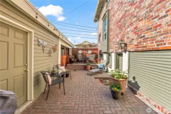 Off to the left side of the home you will find a hand-dug courtyard, perfect for coffee and reading in the morning, or happy hour and entertaining.