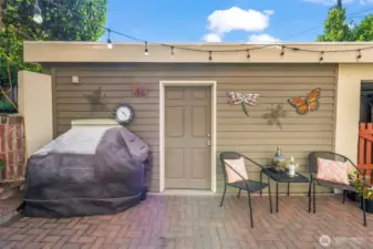 This is the storage room, with custom shelving.  It currently functions as storage, but could be re-imagined into a gym, office, shed or other purpose.  Possibilities and Space!