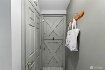This vintage, completely charming Dutch Door acts as the separate entry off the courtyard to the basement suite!