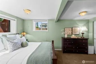 The third bedroom is in the basement, a private retreat.