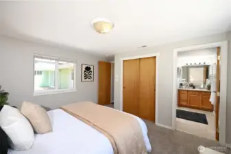 Primary bedroom with plenty of closet space and attached full bath.