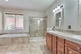 Large 5-piece primary bath with double vanities.