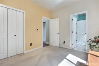 One of two extra bedrooms with a conjoining full bathroom.