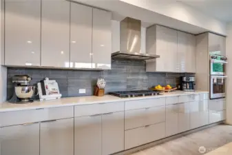 Modern tile backsplash-sleek geometric pattern in matte charcoal, it pops like a gallery piece.