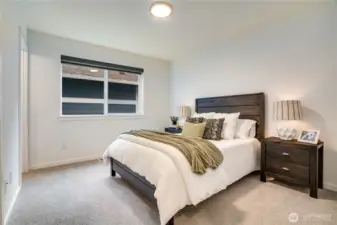 Bedroom 2 of 4 with adjoining full bathroom.