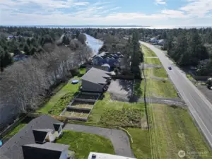 12,000 sq ft Canal Waterfront Lot with a 2400 sq ft Poured Foundation~!