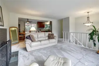 Upper level living room w/ new carpet & paint.