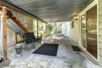 Rear covered patio w/ 2 private entrances for lower-level ADU.