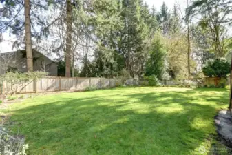 Fully fenced & level rear yard.