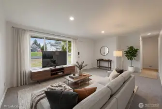 Enter into the large living room with good light on this quiet street. Double paned windows throughout.