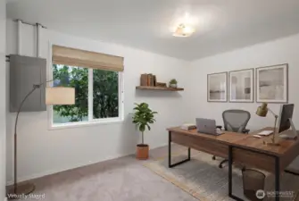 Bedroom #2 with a large window to the outside- office space or could fit a standard bed.