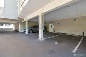 Assigned, covered parking directly in front of the entry!