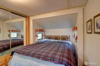 Bedroom with a closet and storage space