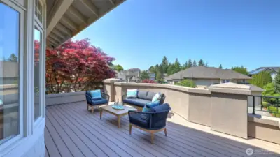 Easy deck access from kitchen nook sporting beautiful sunsets and, in the summer, Blue Angel flyovers!