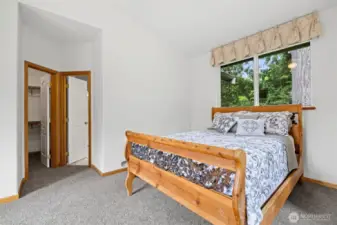 master bedroom with large walk in closet & on suite bathroom